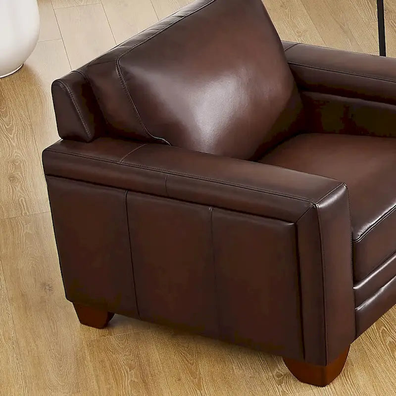Fauteuil en cuir pleine fleur avec plumes, mousse à mémoire de forme et ressorts