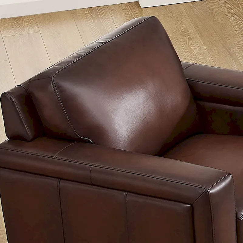 Fauteuil en cuir pleine fleur avec plumes, mousse à mémoire de forme et ressorts
